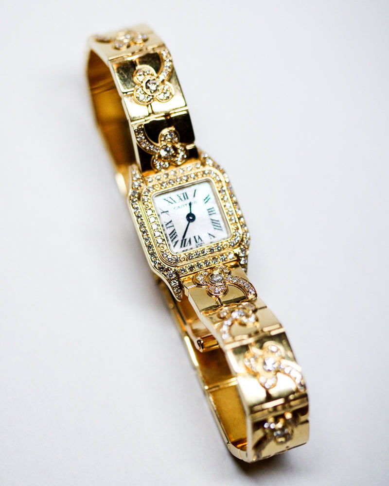 Montre Mini Panthère Fleurs Or Jaune et Diamant signe Cartier