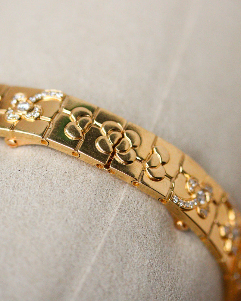 Montre Mini Panthère Fleurs Or Jaune et Diamant signe Cartier