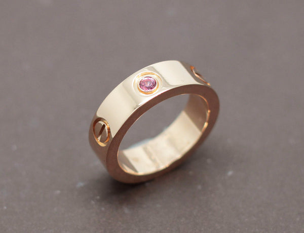 Bague Cartier "Love" Or Rose Saphir Rose