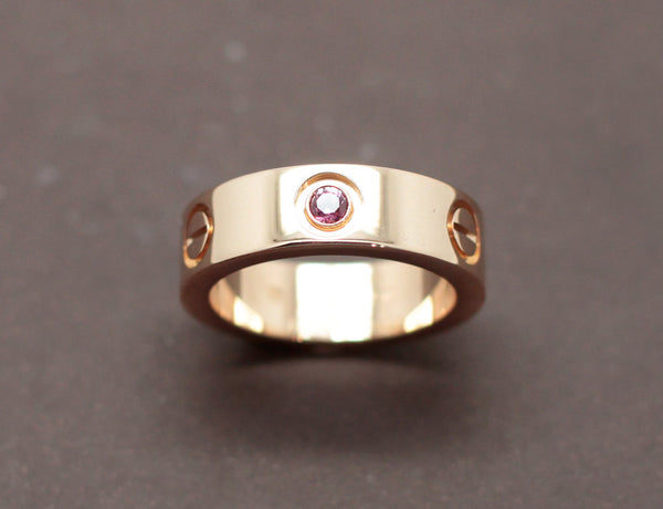 Bague Cartier "Love" Or Rose Saphir Rose