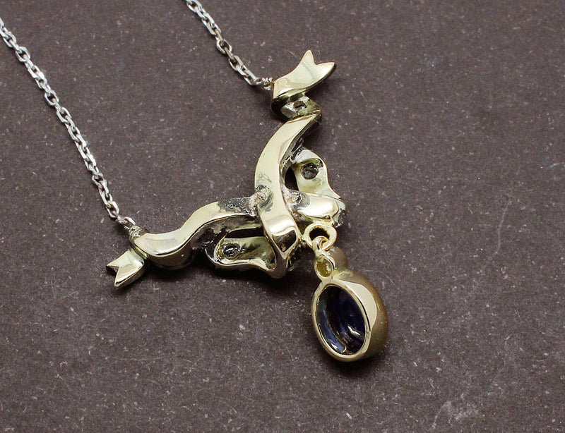 Pendentif Noeud Saphir et Diamants