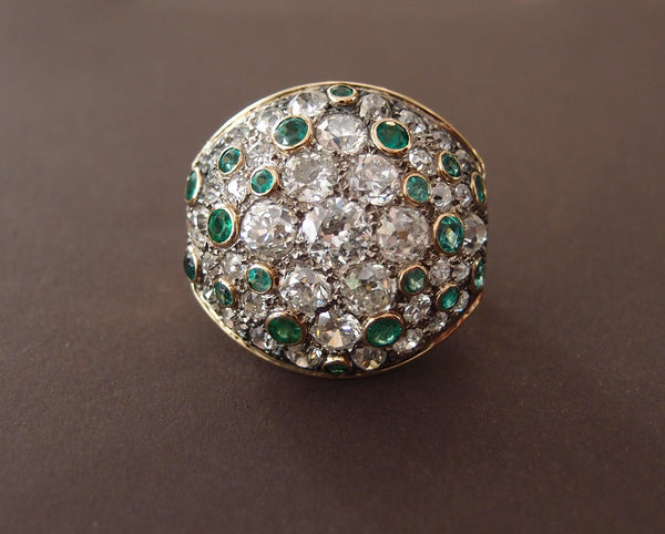 Bague "'Dome" or,platine,diamants et emeraudes