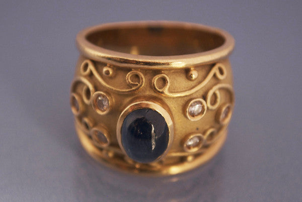 Bague or jaune diamants saphir
