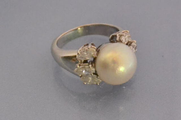 Bague perle et diamants navette