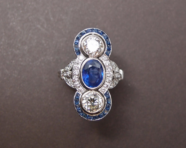 Bague Saphir , diamants et saphirs calibrés