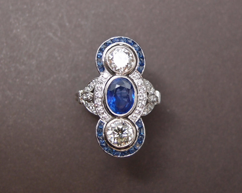 Bague Saphir , diamants et saphirs calibrés