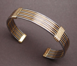 bracelet jonc"fils" Cartier or et acier