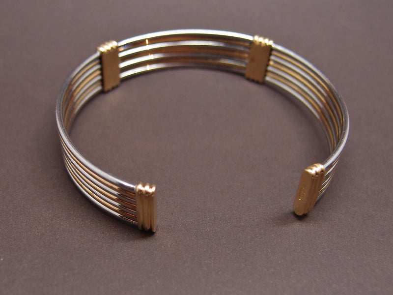 bracelet jonc"fils" Cartier or et acier