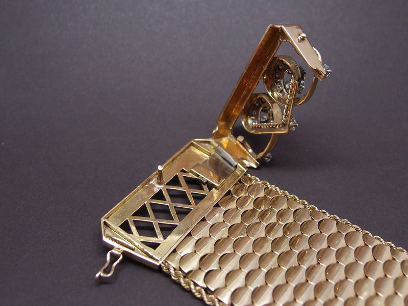 bracelet ceinture vers 1950 , or 18 carats et diamants, 118.6 gr