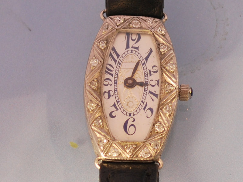 Montre ancienne platine diamants