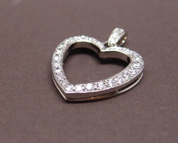 Pendentif Coeur or gris et diamants