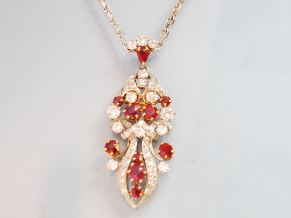 Pendentif or blanc, diamants et rubis