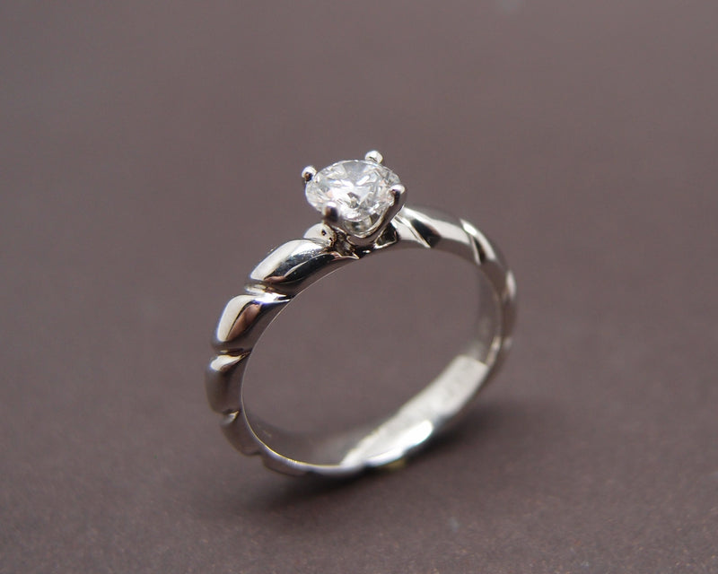 Solitare Chaumet "Torsade"platine Diamant 0.5 ct